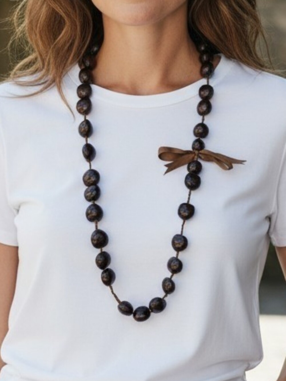 Hawaiian Lei of Dark Brown Kukui Nuts with Ribbon Accent